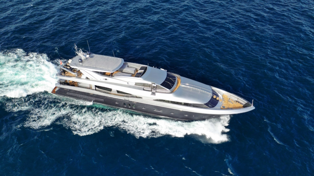 Aerial,drone,photo,of,luxury,yacht,cruising,deep,blue,mediterranean